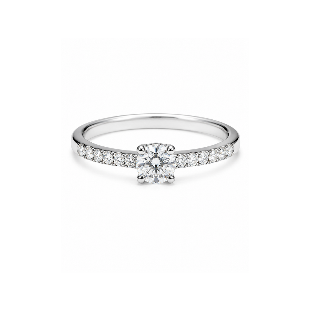 Anillo Solitario Cintillo Platino y Brillantes.