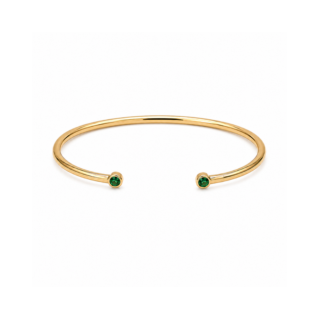 Pulsera Esclava Abierta Oro Amarillo y Esmeraldas 18Kt.