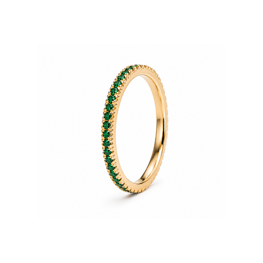 Anillo Cintillo de Esmeraldas en Oro Amarillo 18Kt.