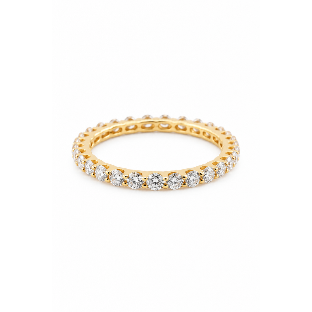 Anillo Cintillo de Brillantes Grifa Compartida en Oro Amarillo 18Kt.