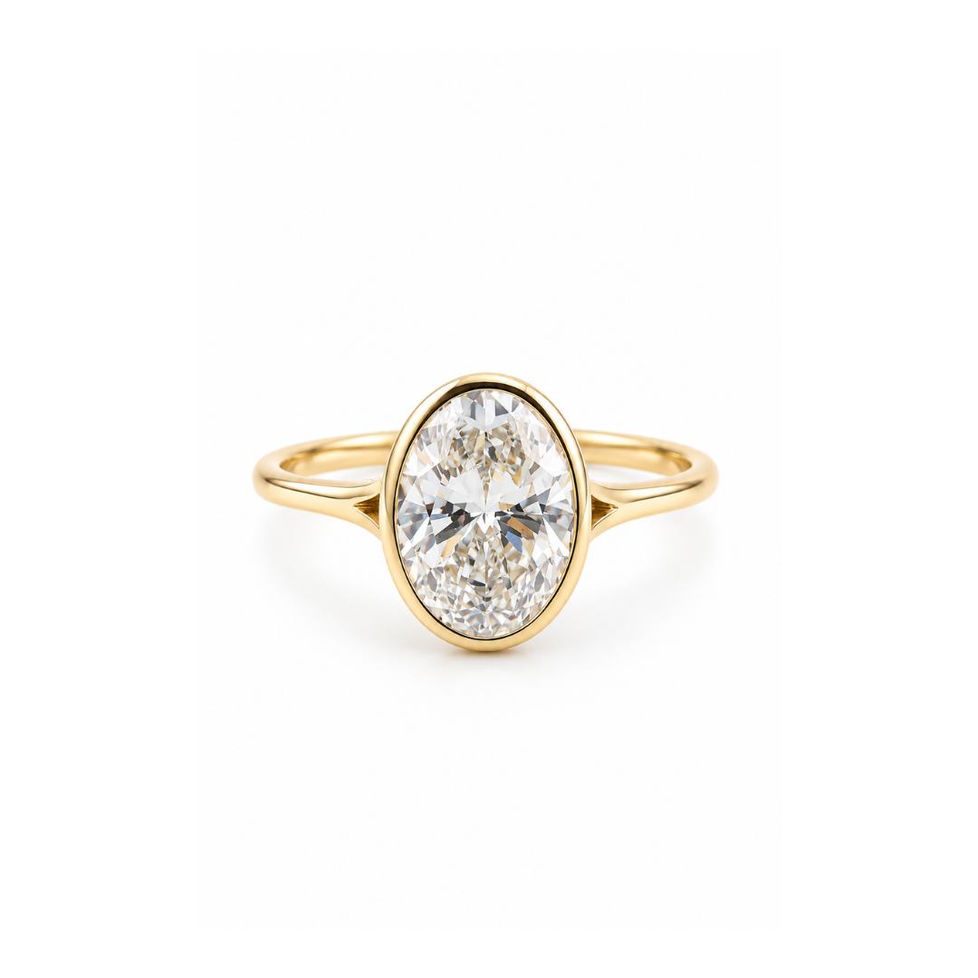 Anillo Brillante Oval Lab. Bisel en Oro Amarillo 14KT.