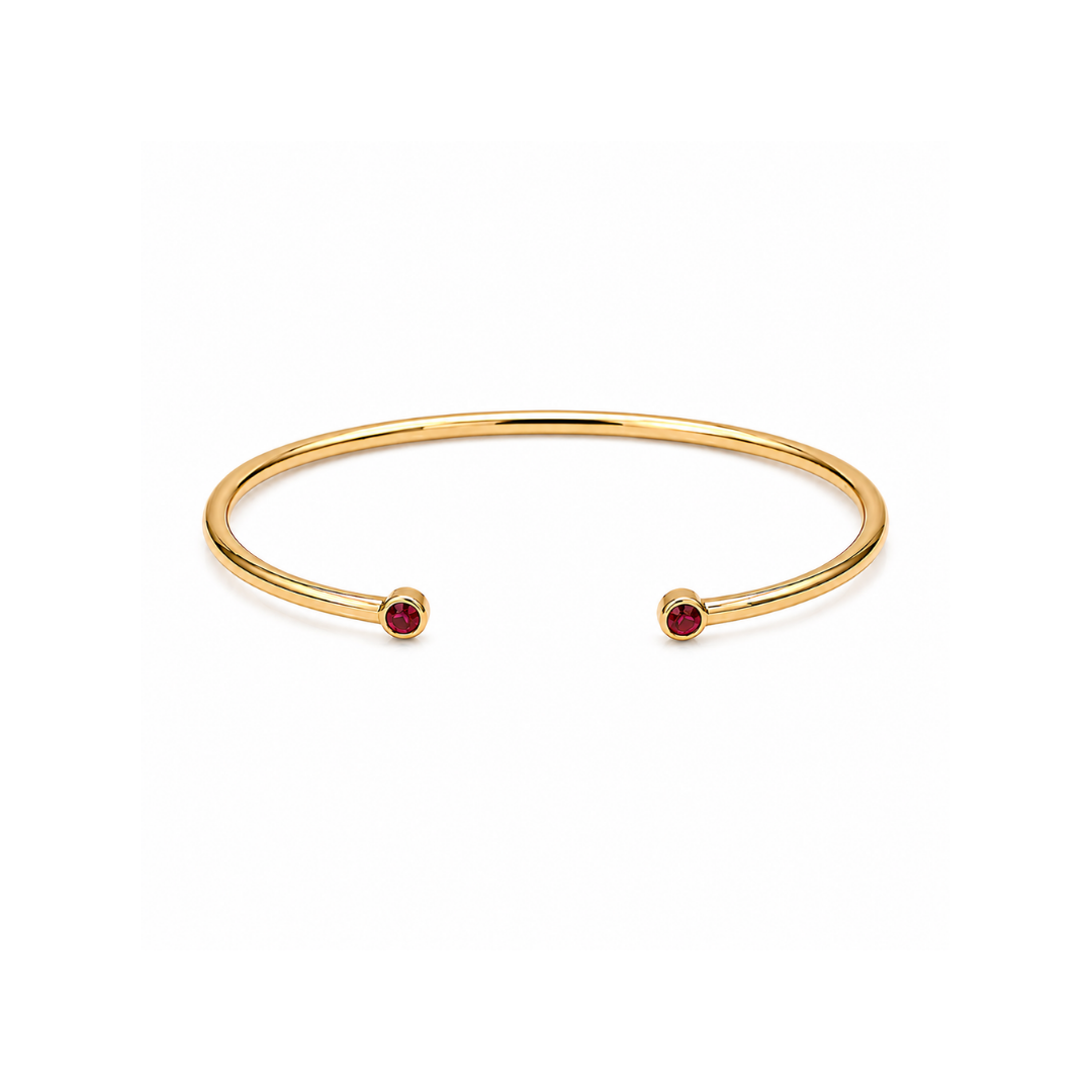 Pulsera Esclava Abierta Oro Amarillo y Rubíes 18Kt.