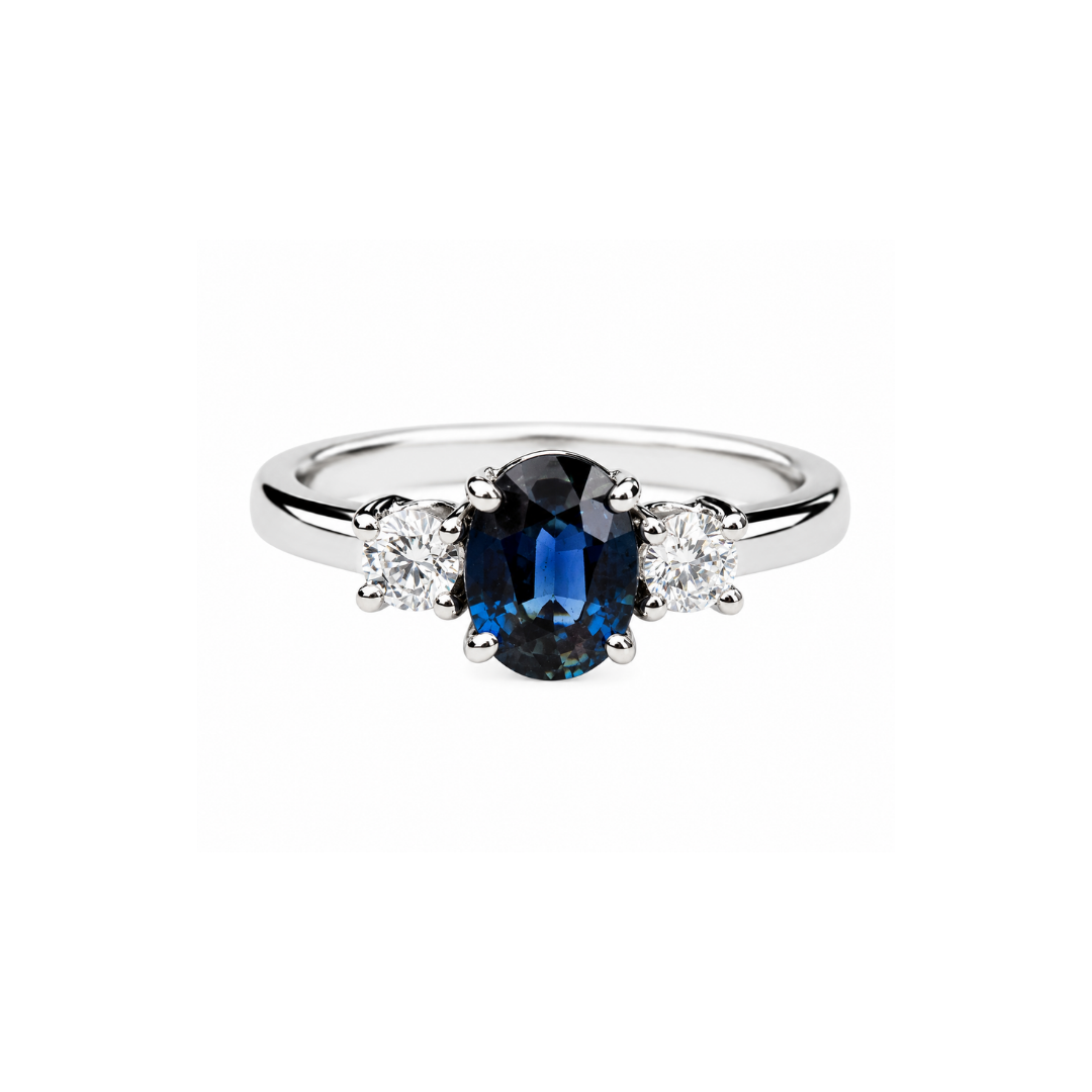 Anillo de Oro Blanco Trilogía de Brillantes y Zafiro.