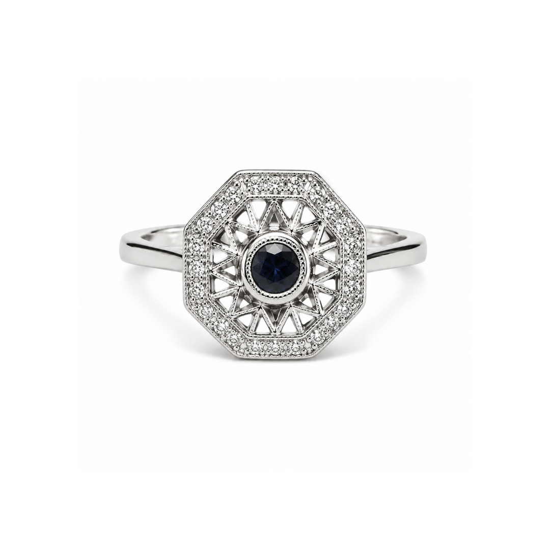Anillo de Oro Blanco Octogonal Brillantes y Zafiro central.