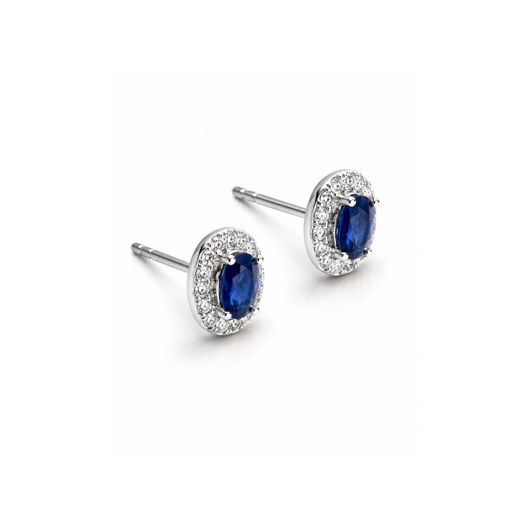 Aros de Platino Brillantes y Zafiro Oval.